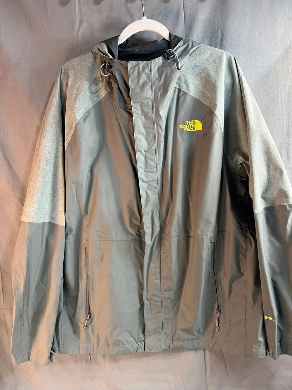 The North Face waterproof men’s XL HyVent 2.5L Shell with Yellow Logo